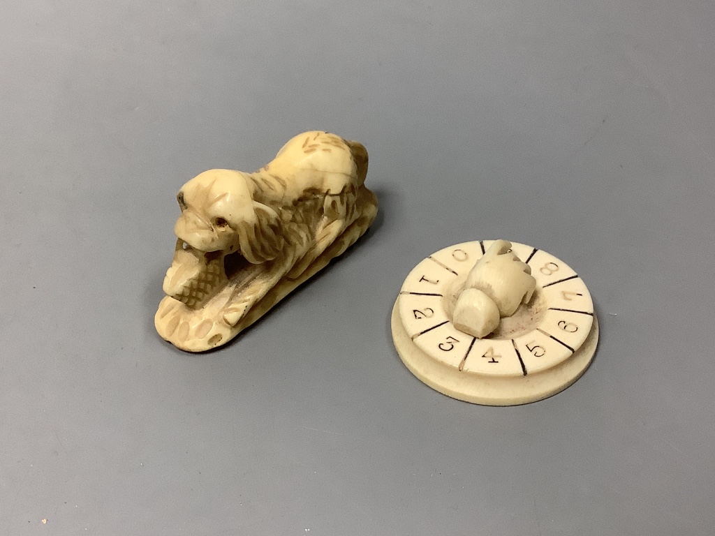 A Canton carved ivory card case (a.f.) and other ivory carvings, 19th/ early 20th century